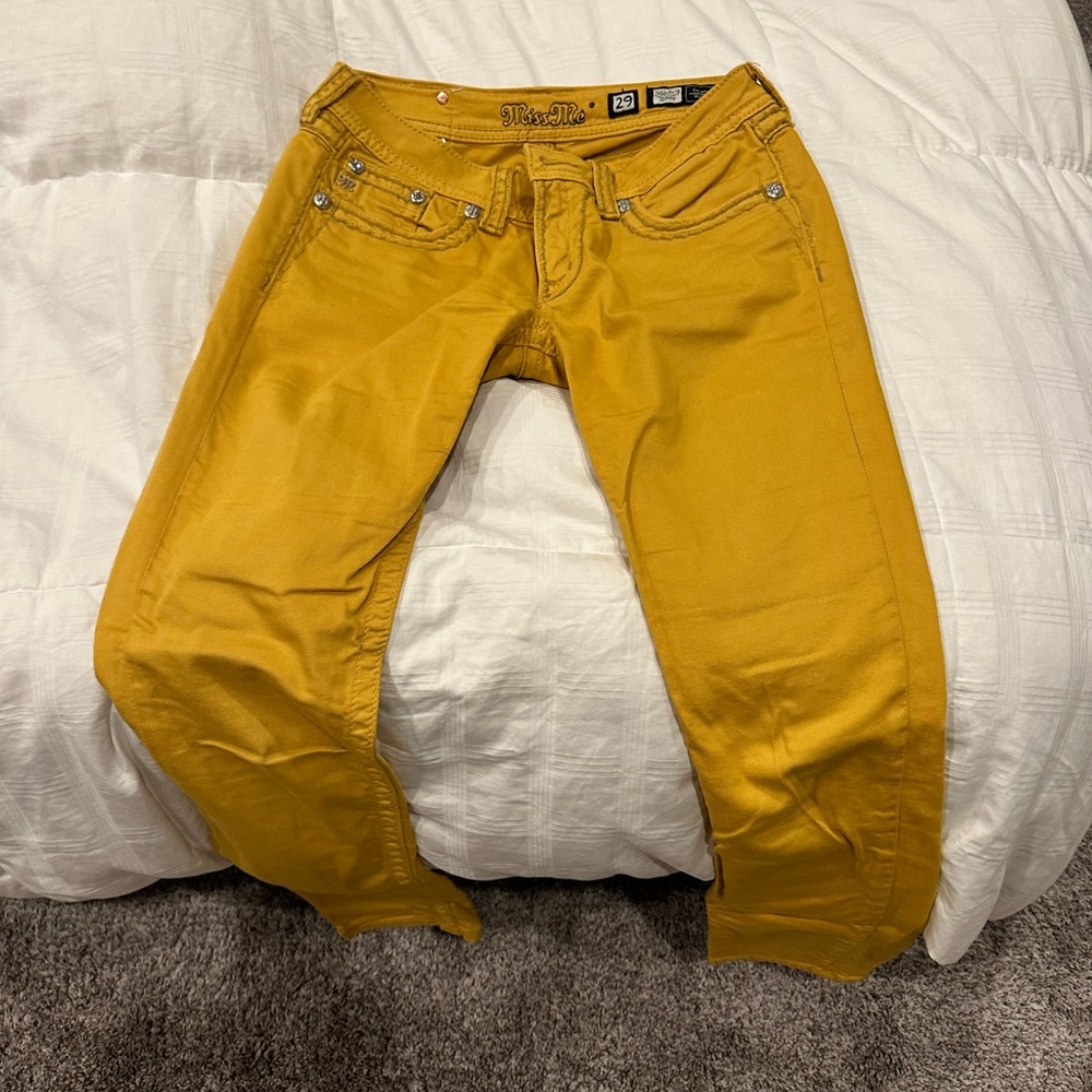 Miss me jeans-mustard color. Beautiful jewels as details with logo buttons
